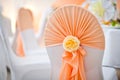 Decoration of a chair on a wedding banquet at restaurant Royalty Free Stock Photo
