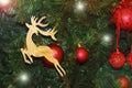 Decoration for the Christmas tree Golden deer for the new year holiday Royalty Free Stock Photo