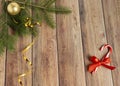 Decoration for christmas on a wooden background. Christmas tree branch and balls for the Christmas tree. New Year celebration. Royalty Free Stock Photo
