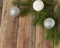 Decoration for christmas on a wooden background. Christmas tree branch and balls for the Christmas tree. New Year celebration Royalty Free Stock Photo