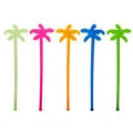 Decoration of colored transparent cocktail sticks in the shape of a palm tree Royalty Free Stock Photo