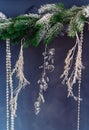 decoration of crystals in the form of drops and hearts, beads on the branches of a Christmas tree