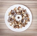 Decoration of dried flowers on the white plate, natural beauty