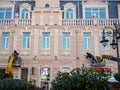 Decoration of the facade of the building with illuminations. Workers on the lift at work. Preparing the City for Christmas