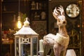 Decoration figurine wooden deer and lamp. home decor holiday