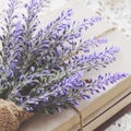 Decoration with lavender bunch upon vintage books bundle Royalty Free Stock Photo