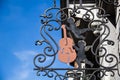 Decoration of a music instrument store in Brussels with angels and a string instrument Royalty Free Stock Photo