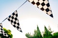 Decoration pennants with black and white squares like the flag of a car racing commissar