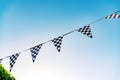 Decoration pennants with black and white squares like the flag of a car racing commissar