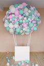 Decoration for the photo zone and holiday balloon made of pink, gray, white and mint balloons