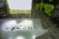 A decoration pond waterfall fountain.