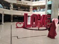 Decoration in shopping center. Department store for Valentine`s Day. Shop holiday decor. Day of all lovers.