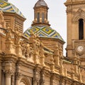 Decoration of statues and other ornaments on the main facade of the Pilar Cathedral, Zaragoza, Spain. Royalty Free Stock Photo