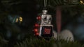 Decoration Toys On Christmas Tree. 4KShot. Nutcracker Soldier ,Vintage Robot On A Christmas Tree With Blurred Background.