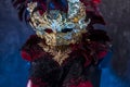 Decoration Venetian red, mask and red corset with pieces of gold Royalty Free Stock Photo