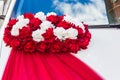 Decoration on a wedding car made of flowers