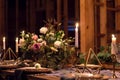 Decoration wedding table before a banquet in wooden barn. Royalty Free Stock Photo