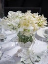 Decoration of wedding table. bouquet of white flowers of sweet p