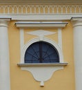 Decorational gridded window on Catholic Church in Vojvodina, Banat in Serbia