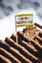 Decorations on a chocolate birthday cake