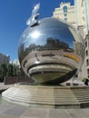 Decorations in the city - metal sphere with a bird