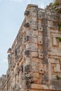 Decorations of a Mayan Temple, depicting men elephants