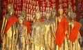 Ancient Buddha statues in Unesco temple Wat Xieng Thong, Luang Prabang, Laos Royalty Free Stock Photo