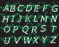 Decorative alphabet decorated with green branches for the design of postcards, banners, cards and logos. Vector illustration Royalty Free Stock Photo