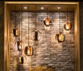 Decorative antique edison style filament light bulbs on brick wall