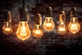 Decorative Antique Edison Style Light Bulbs Against Brick Wall Background for Vintage Lamp Enthusiasts. created with Generative AI Royalty Free Stock Photo