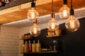 Decorative antique LED tungsten light bulbs hanging on ceiling Royalty Free Stock Photo