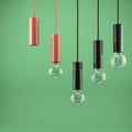 Decorative antique light bulbs against green background Royalty Free Stock Photo