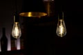 Decorative antique light bulbs and modern light lamp in the restaurant Royalty Free Stock Photo