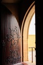 Decorative arched wooden church door