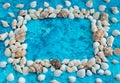 Decorative arrangement of sea shells on a blue background Royalty Free Stock Photo