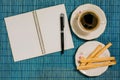 Decorative background coffee, notebook, pen and breackfast