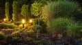 Decorative Backyard Garden Illuminated by Garden Lighting Royalty Free Stock Photo