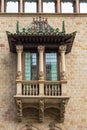 The decorative balcony has a city office building, Barcelona, Spain. Royalty Free Stock Photo
