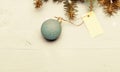 Decorative ball toy and gift tag copy space. Get ready for christmas. Christmas decorations wooden background top view Royalty Free Stock Photo