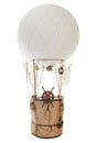Decorative balloon on a white background with a basket, ropes and a helm Royalty Free Stock Photo