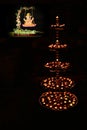 Decorative beautiful traditional Diwali Diya or lamps with Ganesha. Ideal image for Diwali card or greetings.