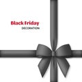 Decorative black bow with dark ribbons. Gift box wrapping and Black Friday decoration Royalty Free Stock Photo