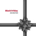 Decorative black bow with dark ribbons. Gift box wrapping and Black Friday decoration Royalty Free Stock Photo