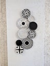 Decorative black and white patterned plates on a wall. Royalty Free Stock Photo