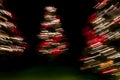 Decorative Blurred Lights of Christmas tree in the dark Royalty Free Stock Photo
