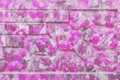 Decorative brick stone fence abstract purple pink spotted paint pattern modern interior wall texture background Royalty Free Stock Photo