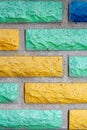 Decorative brick texture background. Stock photo multi-colored brick. Decorative brick poured out of forms