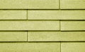 Decorative brick wall in yellow color Royalty Free Stock Photo