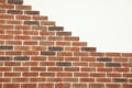 Decorative bricks with tile leveling system on white wall Royalty Free Stock Photo