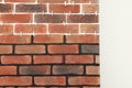 Decorative bricks with tile leveling system on white wall Royalty Free Stock Photo